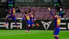 Ousmane Dembele (L) celebrates scoring the winner for Barcelona against Real Valladolid on Monday.