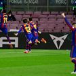 Ousmane Dembele (L) celebrates scoring the winner for Barcelona against Real Valladolid on Monday.