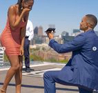 Man proposes marriage to fiancée with 5 different diamond rings, all on the same finger