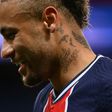All smiles: Paris Saint-Germain's Neymar reacts after scoring on Sunday