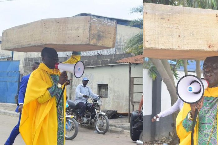 Archbishop Samson Benjamin embarks on a one-man protest with a coffin on his head