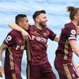 Leeds midfielder Stuart Dallas (C) celebrates after scoring against Manchester City