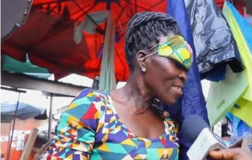 Ghanaian woman gives an interesting reason why she wears her mask the forehead