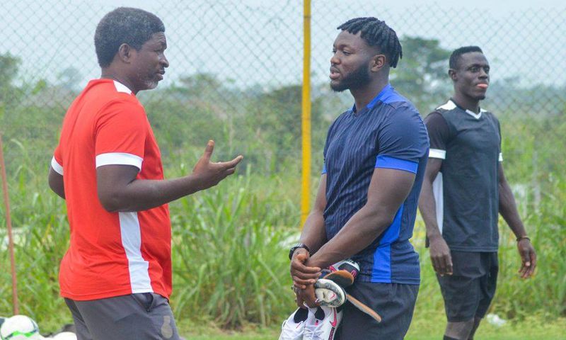Muniru Sulley with coach Maxwell Konadu
