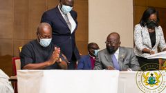 John Mahama and Akufo-Addo in a chit chat during signing of peace pact.