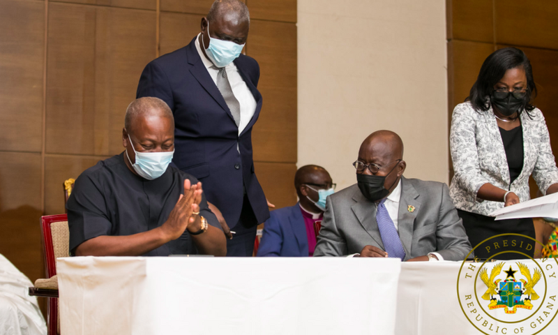 John Mahama and Akufo-Addo in a chit chat during signing of peace pact.