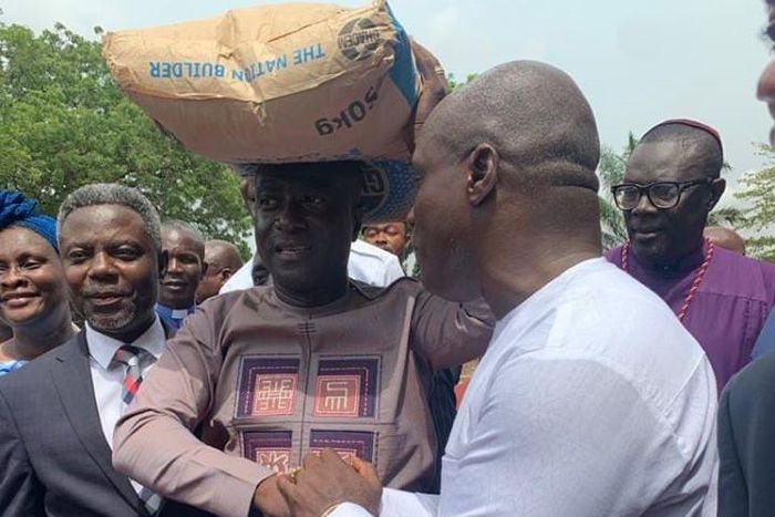 Captain Smart carrying cement bag2