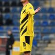 Mats Hummels celebrates his two goals against Arminia Bielefeld last October