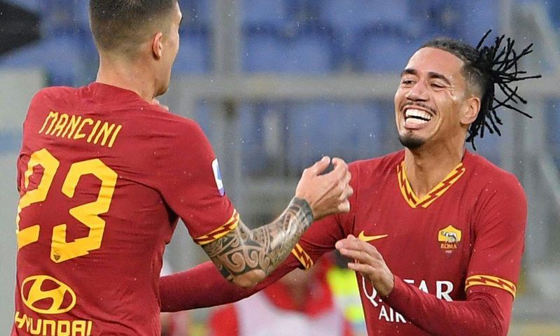 English defender Chris Smalling (R) joined Roma from Manchester United