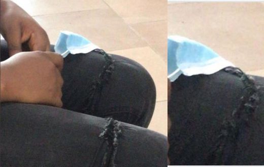 Lady given needle and thread to sew her ripped jeans before she obtains ID card