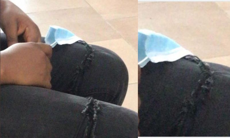 Lady given needle and thread to sew her ripped jeans before she obtains ID card