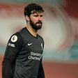Cold feet: Alisson Becker made to mistakes leading to Manchester City goals in Liverpool's 4-1 defeat on Sunday