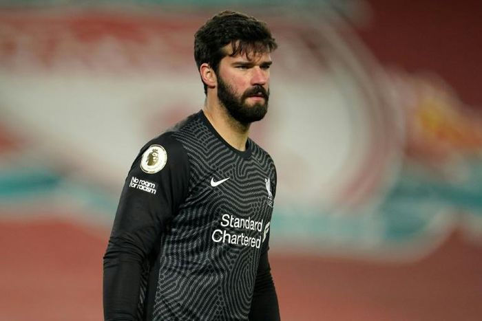 Cold feet: Alisson Becker made to mistakes leading to Manchester City goals in Liverpool's 4-1 defeat on Sunday