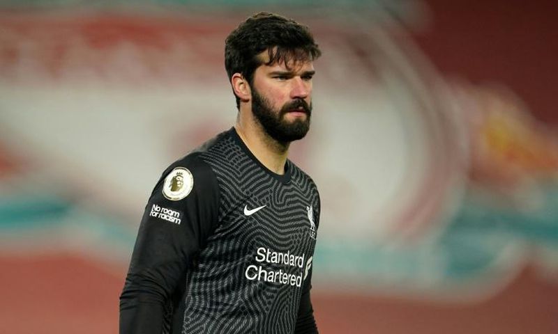 Cold feet: Alisson Becker made to mistakes leading to Manchester City goals in Liverpool's 4-1 defeat on Sunday