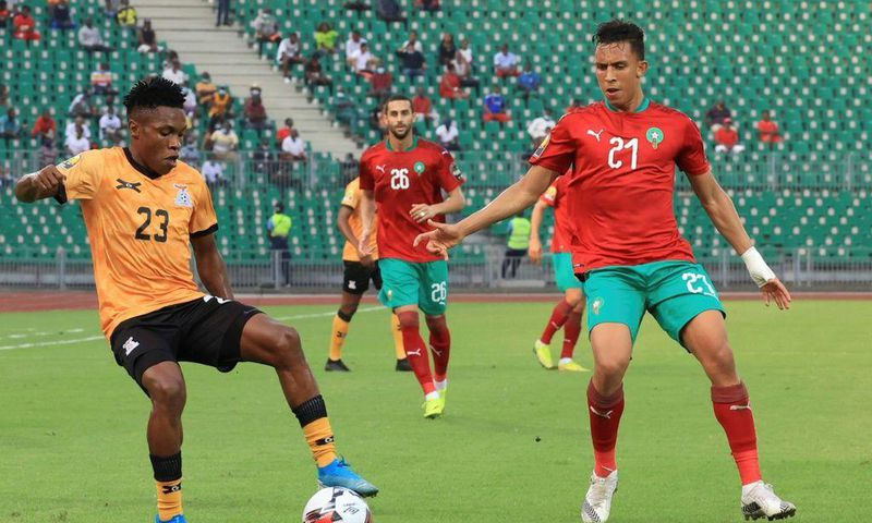 Raja Casablanca star Soufiane Rahimi (R) playing for Morocco against Zambia in the African Nations Championship in Cameroon this year.