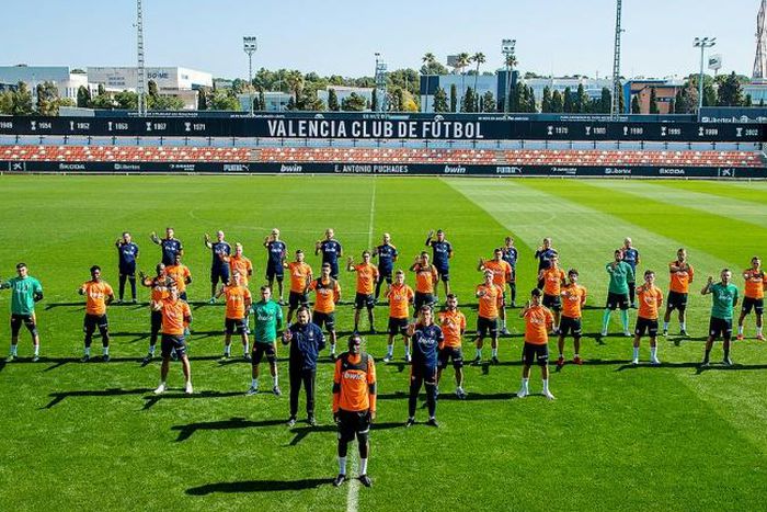 Valencia players lined up behind Mouctar Diakhaby (centre) in a show of support after he alleged he was racially abused