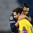 Argentinian midfielder Angel Di Maria consoles Lionel Messi after Paris Saint-Germain knocked Barcelona out of the Champions League on Wednesday.