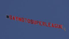 A plane flies above  Elland Road in Leeds before the Premier League game against Liverpool protesting against the planned Super League