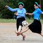 Ethnic San Chi women dressed in traditional costumes play a friendly football match as part of the Soong Co festival celebrations in northern Vietnam's Quang Ninh province