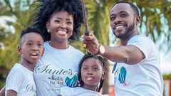 Okyeame Kwame with wife and children