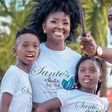 Okyeame Kwame with wife and children