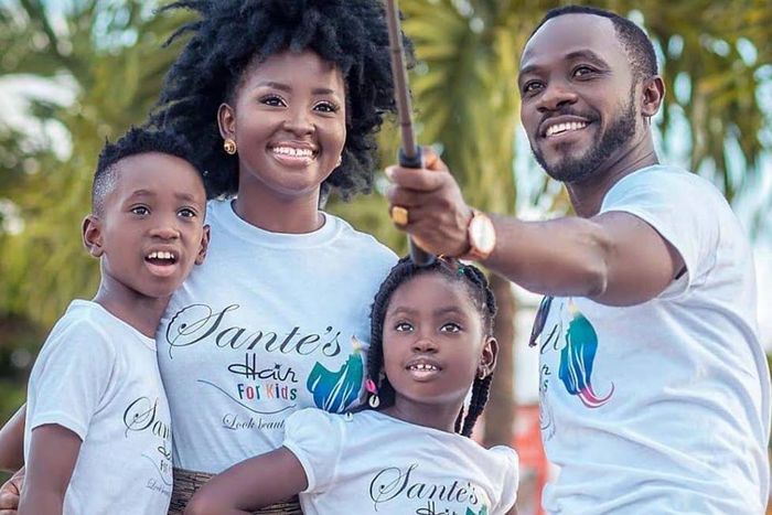 Okyeame Kwame with wife and children