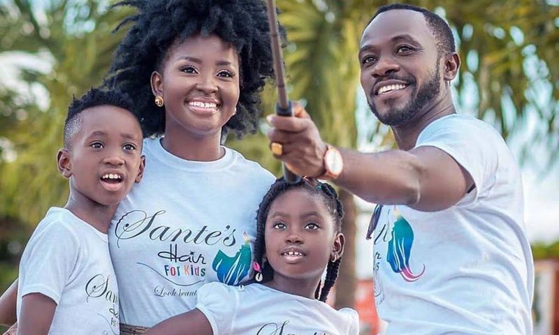 Okyeame Kwame with wife and children