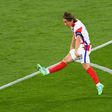 Maestro: Luka Modric's stunning strike helped Croatia beat Scotland 3-1 to reach the last 16 of Euro 2020