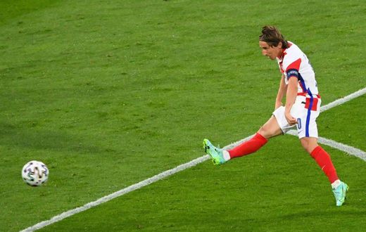 Maestro: Luka Modric's stunning strike helped Croatia beat Scotland 3-1 to reach the last 16 of Euro 2020