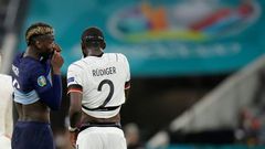 France midfielder Paul Pogba (left) speaks with Germany defender Antonio Ruediger during their Euro 2020 match in Munich