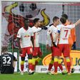 Dani Olmo (C) celebrates scoring RB Leipzig's second goal at home to Bremen on Saturday