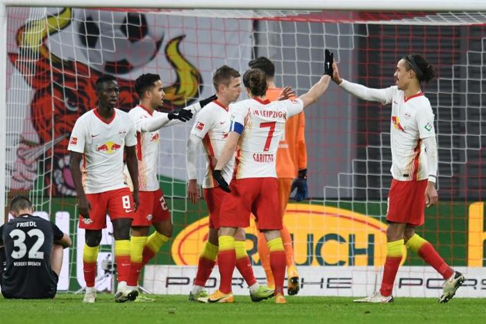 Dani Olmo (C) celebrates scoring RB Leipzig's second goal at home to Bremen on Saturday