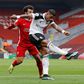 Liverpool star Mohamed Salah (L) cannot prevent Mario Lemina (R) scoring to give Fulham a shock victory at Anfield.