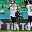 Robin Gosens (L) celebrates scoring Germany's fourth goal in Munich on Saturday at Euro 2020