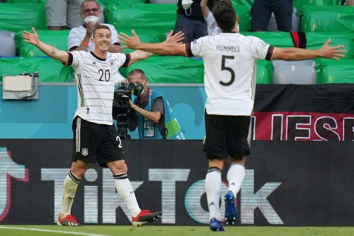 Robin Gosens (L) celebrates scoring Germany's fourth goal in Munich on Saturday at Euro 2020