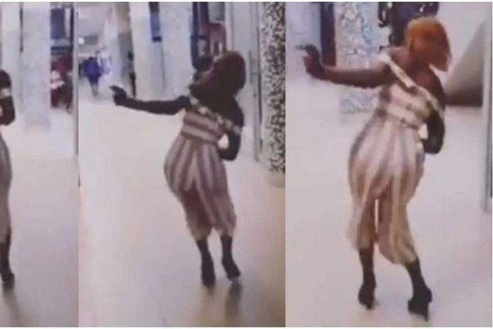 You can't stop laughing at this lady's trouble with her high heel shoes