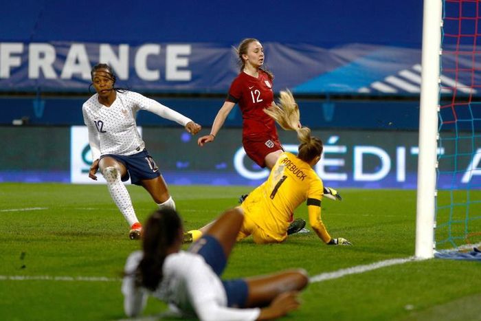 That seals it: France forward Marie-Antoinette Katoto reacts after scoring the third goal