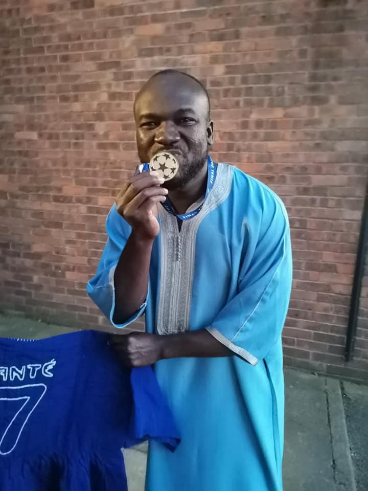 Abu Bakr Bapube kisses Kante's Champions League winners medal