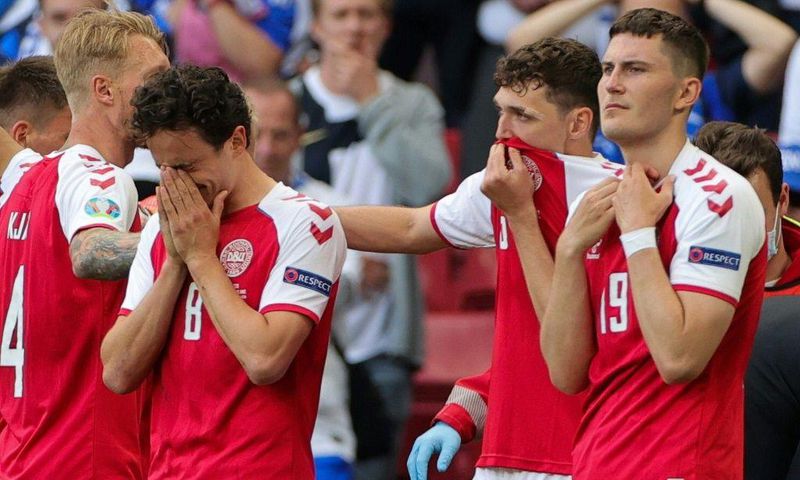 Denmark players were distraught as Christian Eriksen was revived by medics after collapsing
