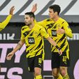 Dortmund's US midfielder Giovanni Reyna (R) celebrates scoring the-equaliser at Frankfurt in mid December