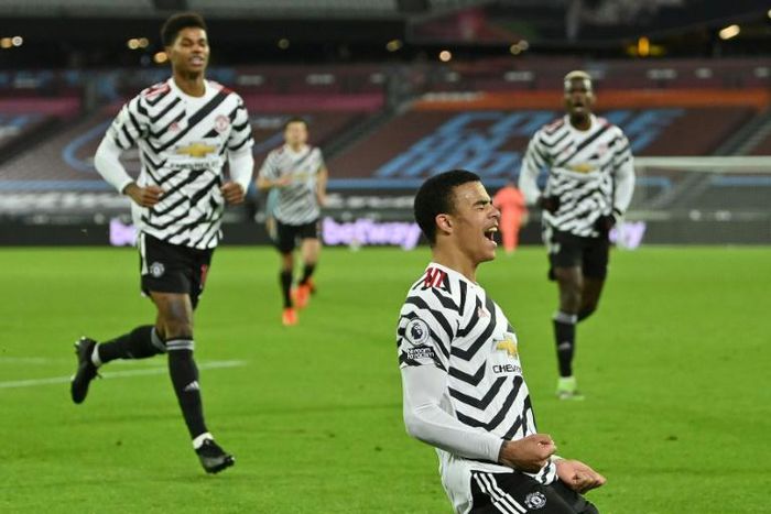 Mason Greenwood (centre)celebrates his first Premier League goal of the season