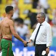 Portugal coach Fernando Santos consoles Cristiano Ronaldo after the defeat in Munich