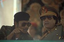 Jerry John Rawlings and Muammar Al Gaddafi