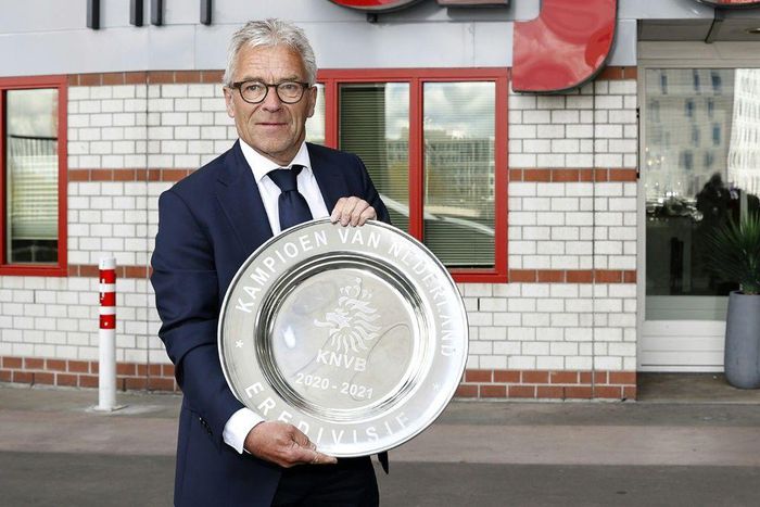 KNVB general director Eric Gudde poses with the Dutch Eredivisie trophy