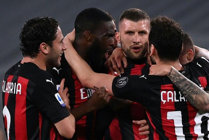 AC Milan's Croatian forward Ante Rebic (2ndR) scored a hat-trick at Torino.