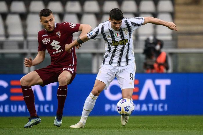 Spanish forward Alvaro Morata (R) has extend his loan with Juventus until June 2022.
