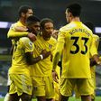 Fulham players celebrate their goal at Tottenham