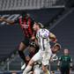 AC Milan's English defender Fikayo Tomori (Top L) headed in a third goal against Juventus in Turin.