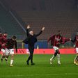 Stefano Pioli's (C) AC Milan are pushing for a first Serie A title since 2011.