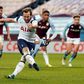 Spot on: Harry Kane (2nd left)sealed a much-needed win for Tottenham at Aston Villa